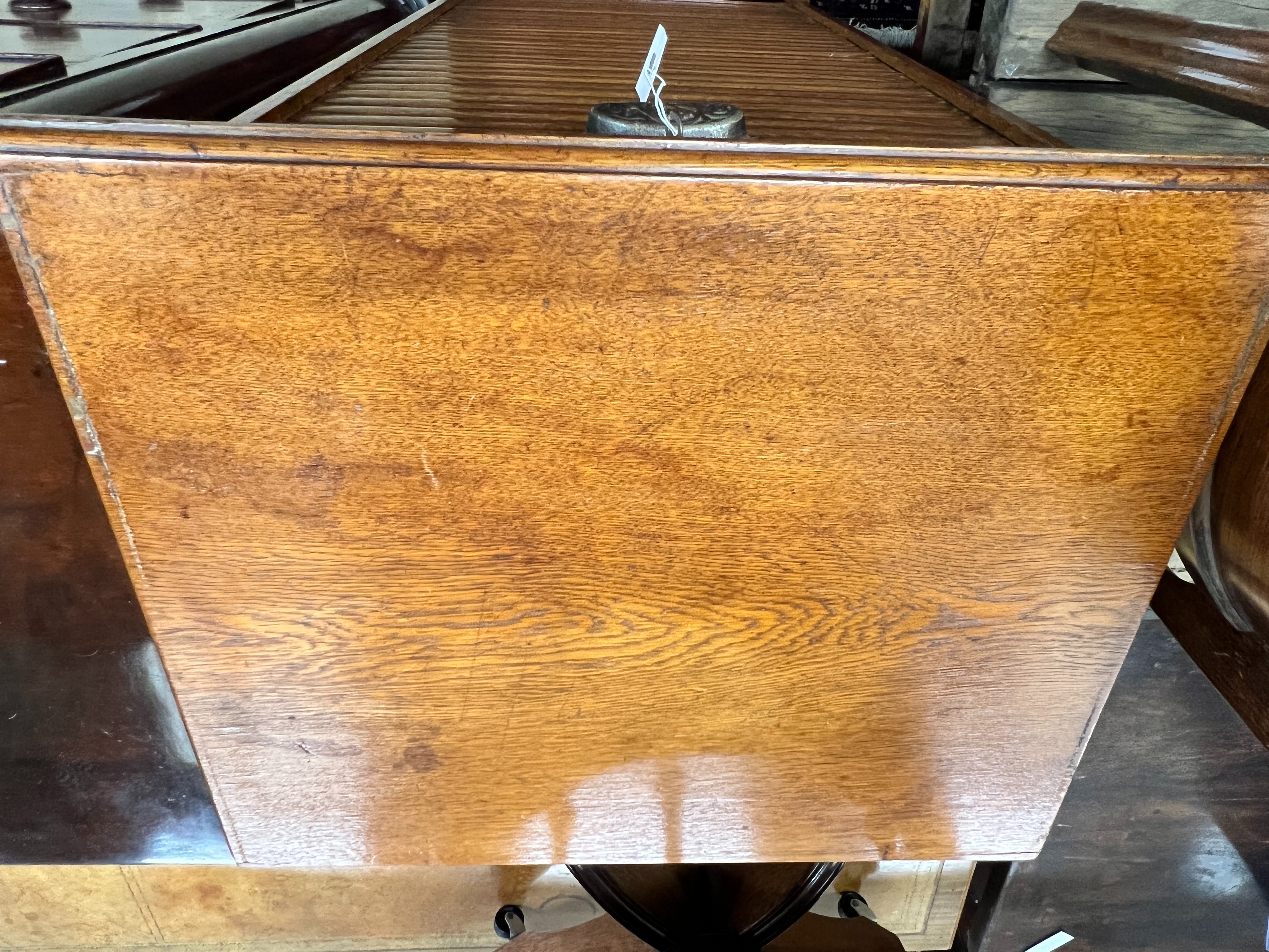 An early 20th century oak tambour filing cabinet, width 50cm, depth 42cm, height 115cm